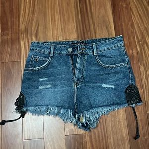 Unique Denim Shorts with black lace up detail! From Zara. Size 6 but run small